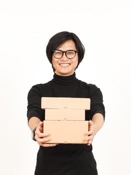 Holding Package Box or Cardboard Box Of Handsome Asian Man Isolated On White Background photo