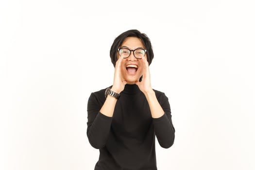 Announcement with hands over mouth Of Handsome Asian Man Isolated On White Background photo