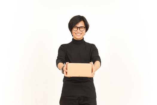 Holding Package Box or Cardboard Box Of Handsome Asian Man Isolated On White Background photo