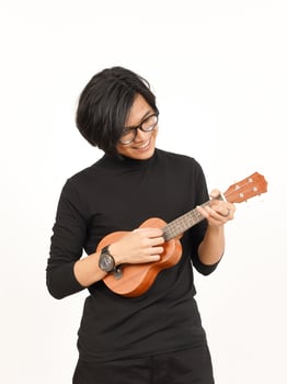 Playing Ukulele Of Handsome Asian Man Isolated On White Background photo