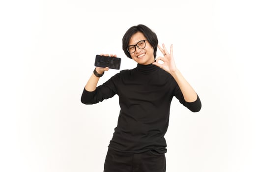 Showing Apps or Ads On Blank Screen Smartphone Of Handsome Asian Man Isolated On White Background photo