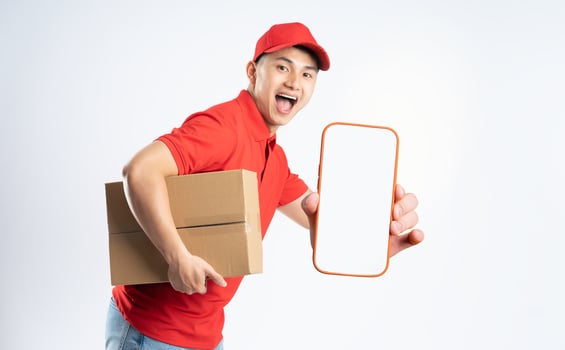 portrait of asian delivery man on white background photo