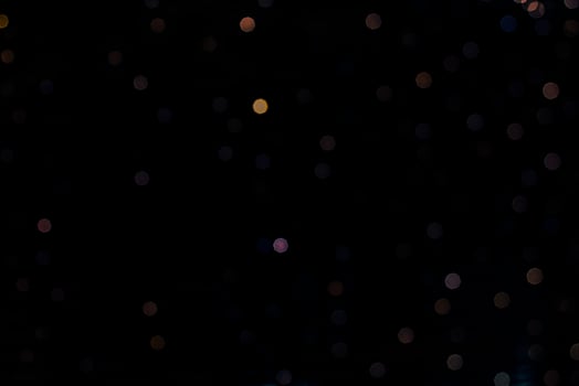 abstract bokeh background of golden light burst made from bokeh motion. photo