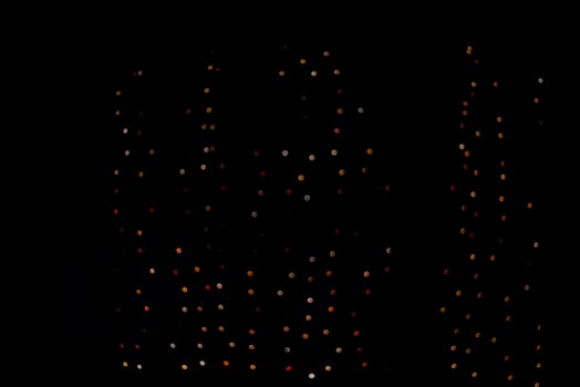 abstract bokeh background of golden light burst made from bokeh motion. photo