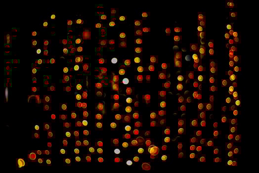 abstract bokeh background of golden light burst made from bokeh motion. photo