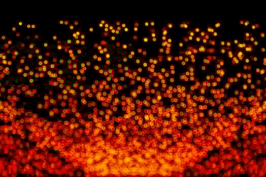 abstract bokeh background of golden light burst made from bokeh motion. photo