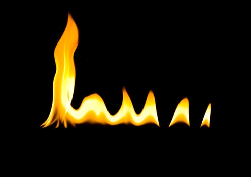 Fire flame isolate on black background. Burn flames, abstract texture. Art design for fire pattern, flame texture. photo