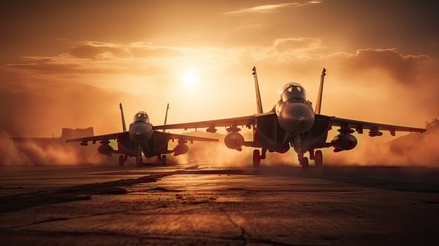 Militar aircraft flying over the clouds in amazing sunset. . photo