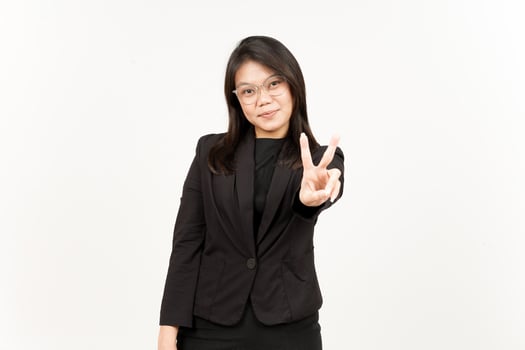 Showing Peace Sign Of Beautiful Asian Woman Wearing Black Blazer Isolated On White Background photo