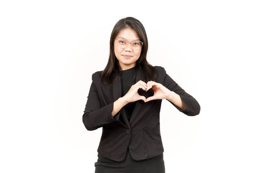 Showing Love Sign Of Beautiful Asian Woman Wearing Black Blazer Isolated On White Background photo