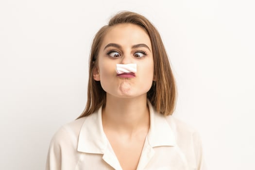 Woman with candy marshmallow-like mustache photo