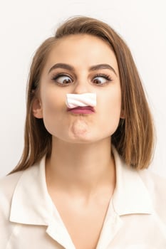 Woman with candy marshmallow-like mustache photo