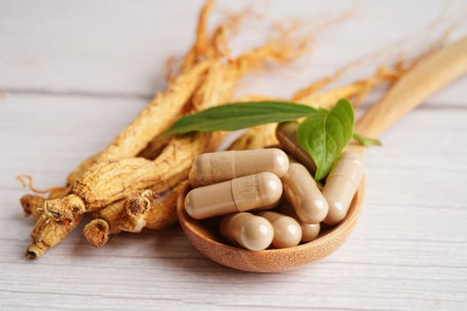 Ginseng roots and green leaf, healthy food. photo