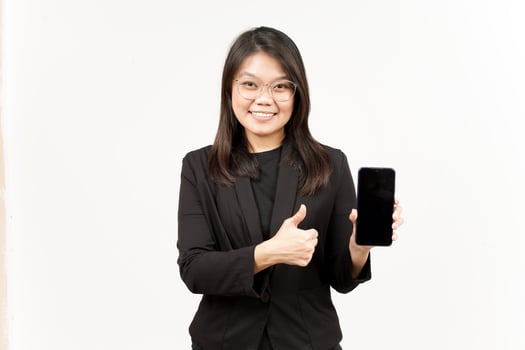 Showing Apps or Ads On Blank Screen Smartphone Of Beautiful Asian Woman Wearing Black Blazer photo