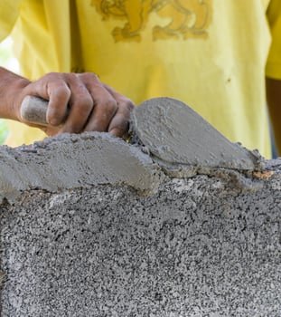 Bricklayer working in site photo