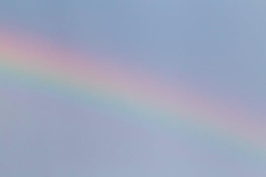 close up of rainbow in a sky at rain photo