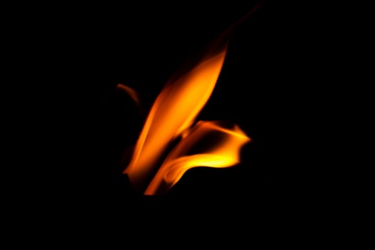 Fire flame texture. Burning material backdrop. Burn effect pattern. Blaze and torch wallpaper. Heat and haze backdrop. photo