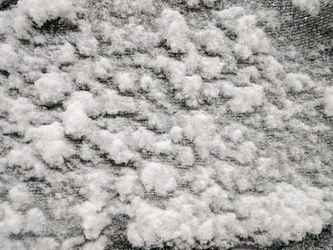 Texture of fresh snowy cloth Winter snow background photo