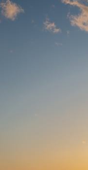 Cover page with gradient deep blue sky, illuminated clouds at bloody sunset as a background. photo