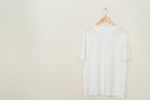 t-shirt hanging with wood hanger photo