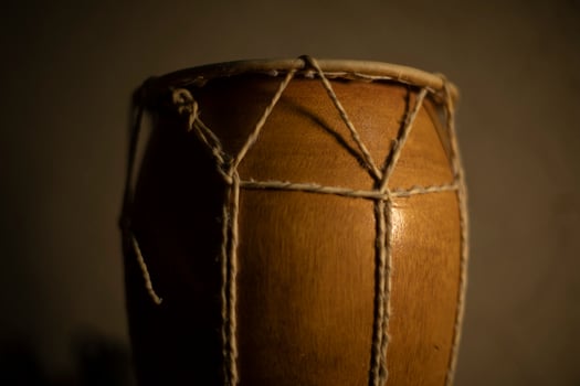Wooden drum. African percussion instrument. Traditional musical instrument. photo