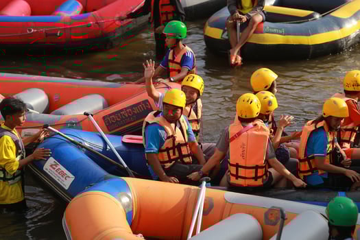NAKHONNAYOK, THAILAND,DECEMBER 19  Group of adventurer doing white water rafting at dam, on December 19, 2015,The river is popular for its scenic nature view. photo