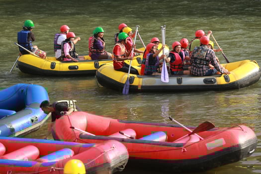 NAKHONNAYOK, THAILAND,DECEMBER 19  Group of adventurer doing white water rafting at dam, on December 19, 2015,The river is popular for its scenic nature view. photo