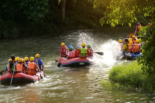 NAKHONNAYOK, THAILAND,DECEMBER 19  Group of adventurer doing white water rafting at dam, on December 19, 2015,The river is popular for its scenic nature view. photo