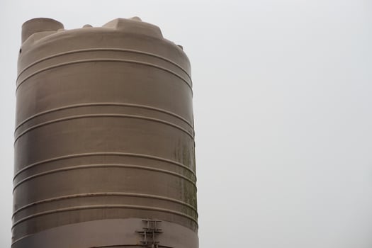 Big water tank outdoor for storage freshwater or rainwater to use in summer. Concept, prepare water to solve drought problems. Storage container for water using in accomodation or agriculture. photo