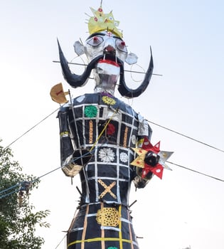 Ravnans being ignited during Dussera festival at ramleela ground in Delhi, India, Big statue of Ravana to get fire during the Fair of Dussera to celebrate the victory of truth by Lord Rama photo