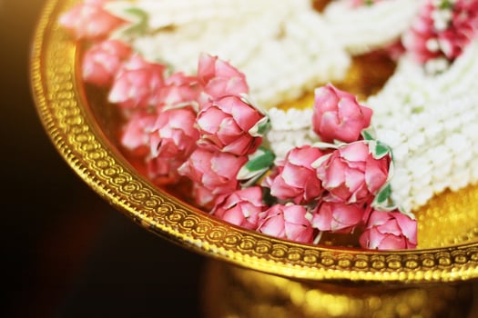 Flower garlands on a gold tray in tradition Thai wedding ceremony day. Jasmine garland. photo