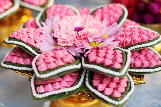 Beautiful flowers decoration on Engagement gold bowl for Thai engagement ceremony.Thai wedding culture tradition photo