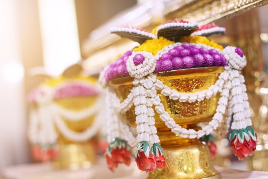 Beautiful flowers decoration on Engagement gold bowl for Thai engagement ceremony.Thai wedding culture tradition photo