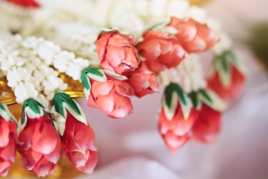 Flower garlands on a gold tray in tradition Thai wedding ceremony day. Jasmine garland photo