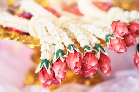 Flower garlands on a gold tray in tradition Thai wedding ceremony day. Jasmine garland photo
