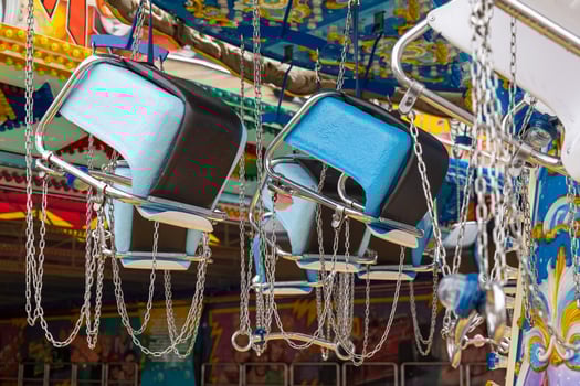childrens chain carousel at a funfair photo