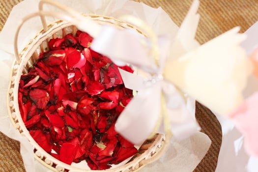 Beautiful red Rose petals Flowers in basket decorated in wedding ceremony photo