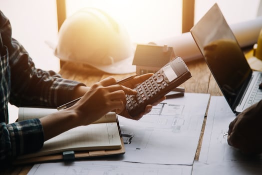 Construction and structure concept of Engineer or architect meeting for project working with partner and engineering tools on model building and blueprint in working site, contract for both companies. photo