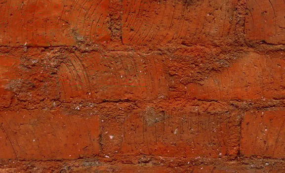 Red brick textured walls background photo exterior isolated on landscape template. Empty copy space wallpaper for social media post, poster, brochure, and other purpose.