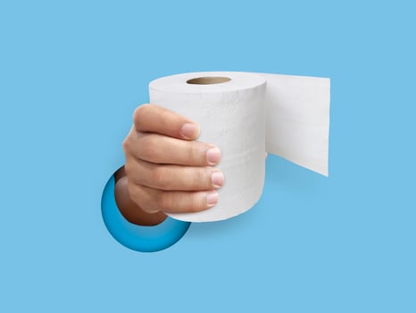 hand holding toilet paper over through the wall light blue photo