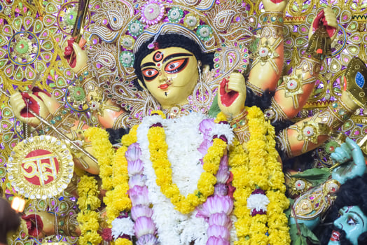 Goddess Durga with traditional look in close up view at a South Kolkata Durga Puja, Durga Puja Idol, A biggest Hindu Navratri festival in India photo