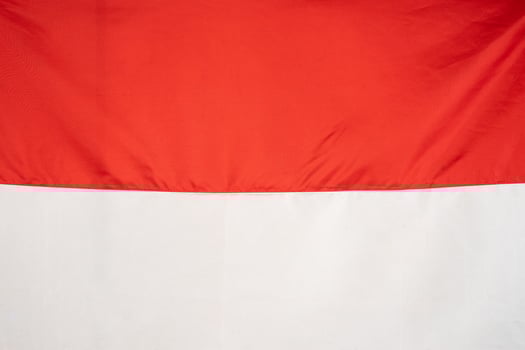 Red and white national flag of Indonesia. Independence day texture background photo