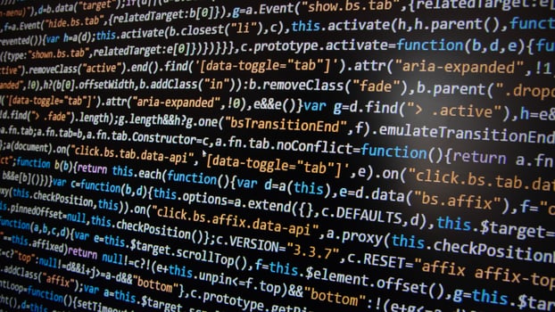 Computer program code on a black background. Close-up. High quality photo