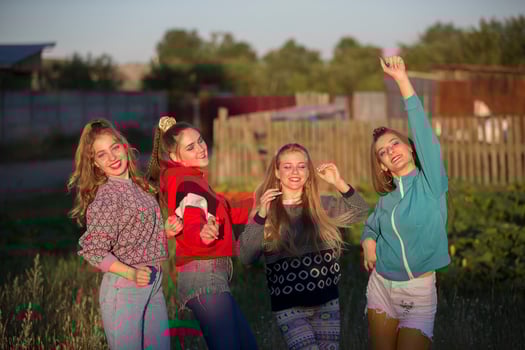 Girls in the style of the nineties. Country girls posing for the camera. photo