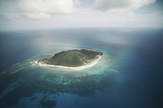 Aerial view of a small island in the middle of the ocean. photo