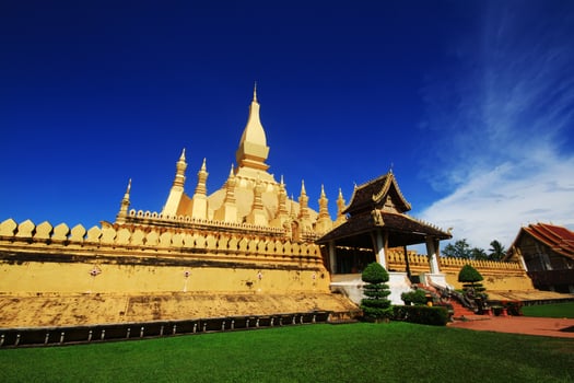 Beautiful great golden Pagoda at Wat Pha That Luang Temple at Vientiane province, Laos photo