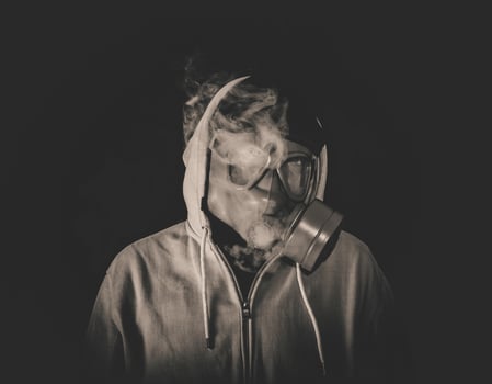 Smoking man with mask photo