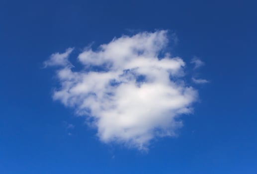 white cloud in a blue sky photo