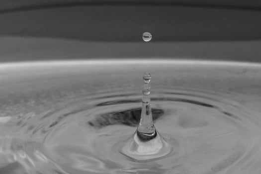falling drops in water photo