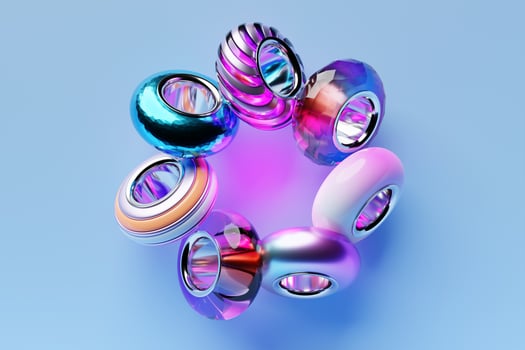 beads are scattered on a blue background. Close up photo